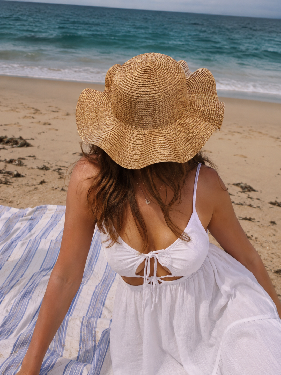 Cappello da mare anti-UV Summr indossato in spiaggia